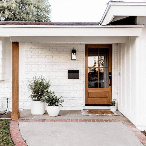 white brick house with french door