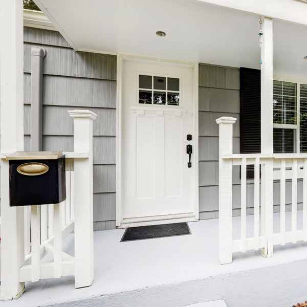 grey house with white door